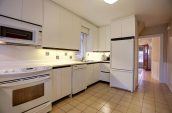 kitchen with white cabinets and appliances