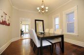 rectangular black wooden table and white chairs set