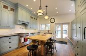 wooden kitchen with blue cabinets