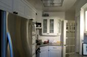 closed gray refrigerator inside kitchen