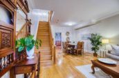 brown wooden coffee table and stairs